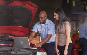 Mechanic helping a customer