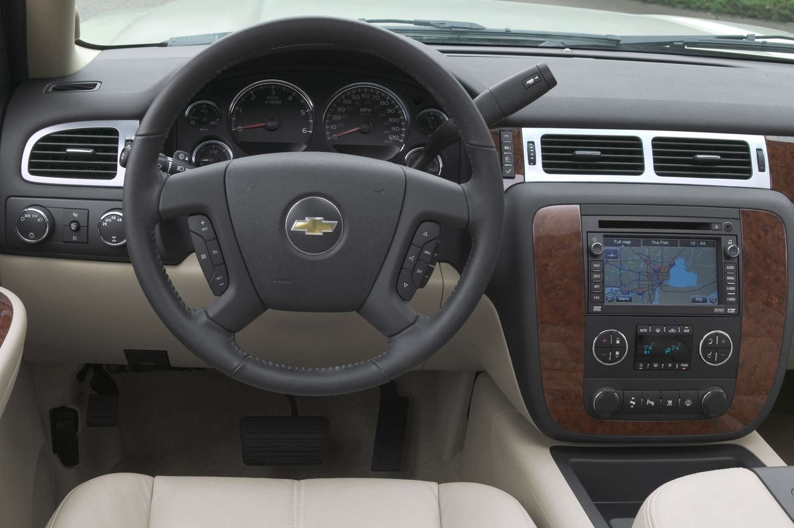 The interior of the 2012 Chevrolet Tahoe with maps showing on the centre consol.