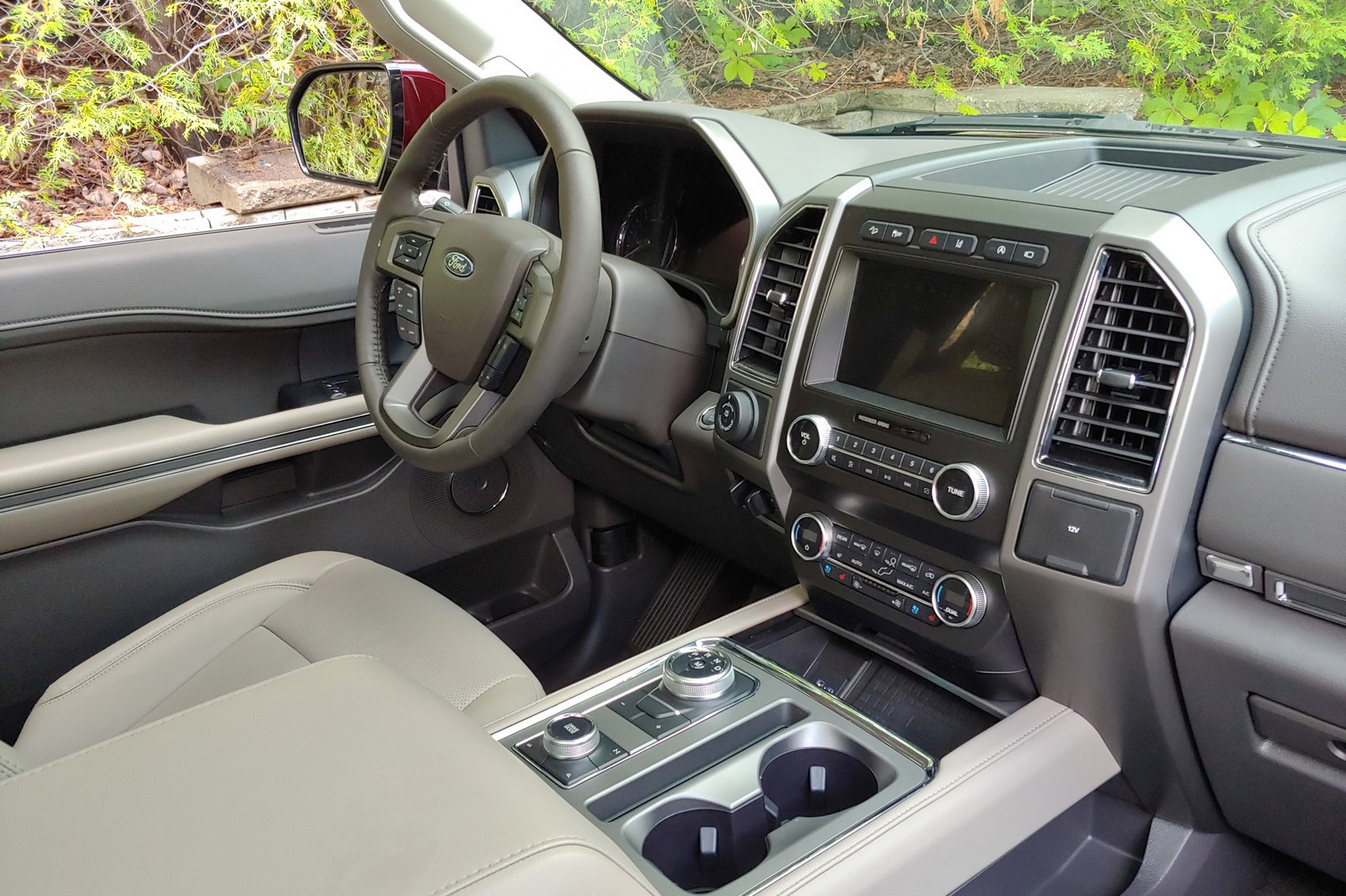 The interior of a 2022 Ford Expedition with a light interior.