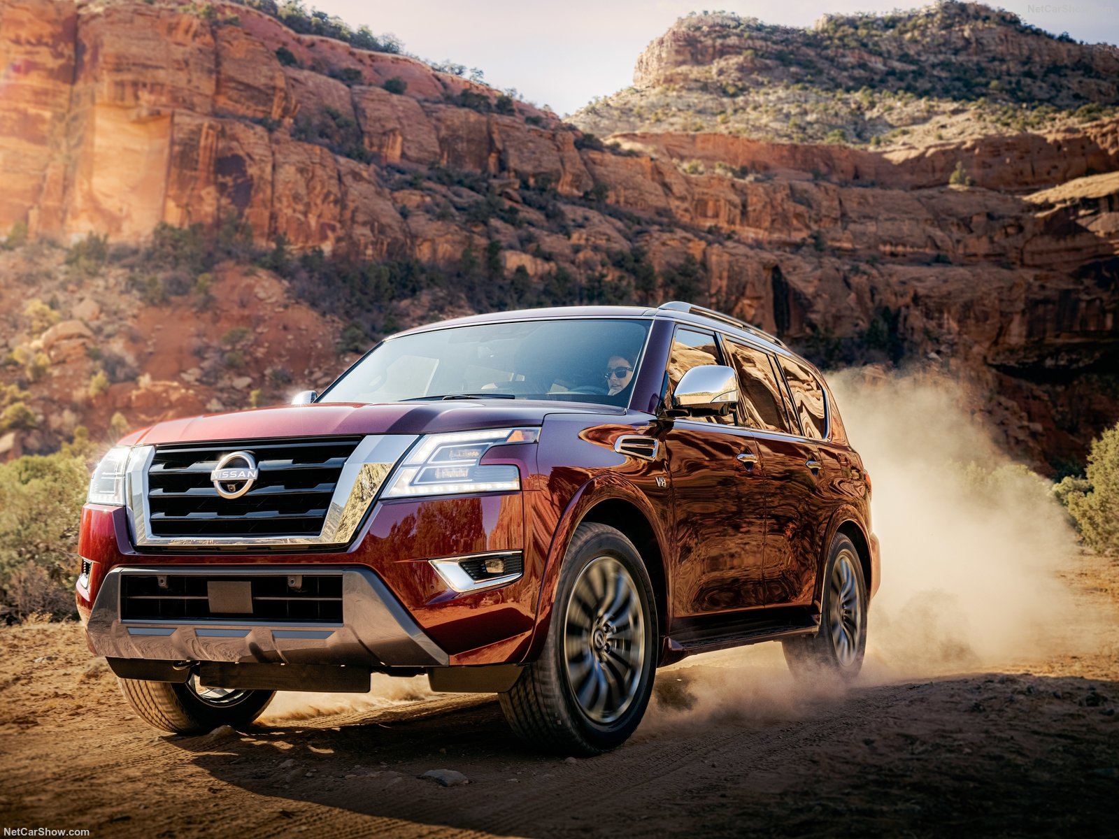 Red 2022 Nissan Armada driving off road.