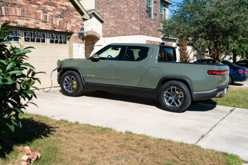 Rivian R1T Electric Truck charging at suburb home