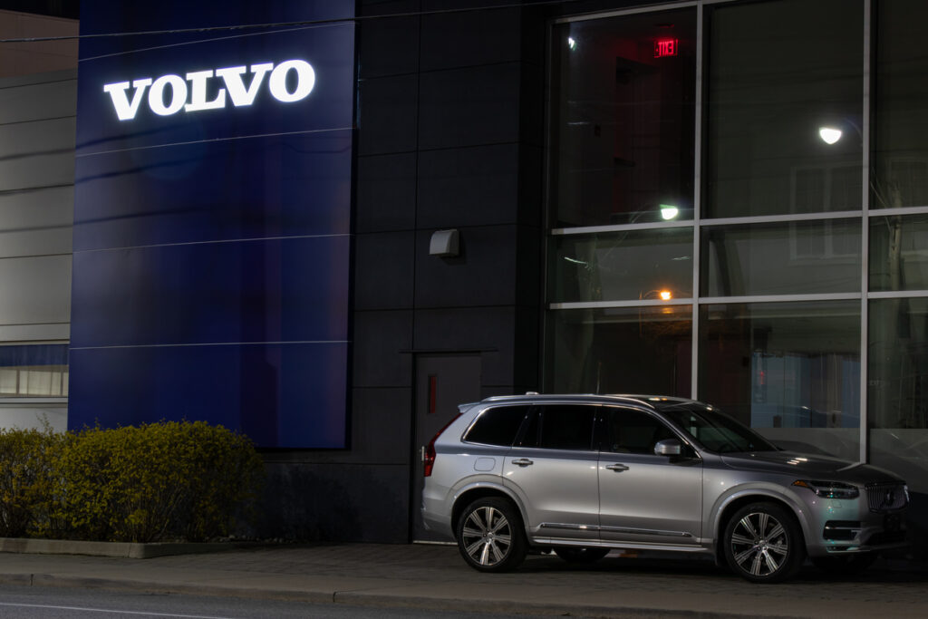 Volvo Dealership at Night with XC90 SUV