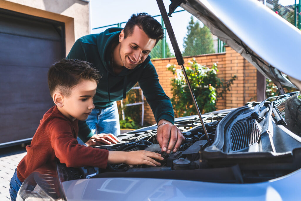 The father and son repair a car